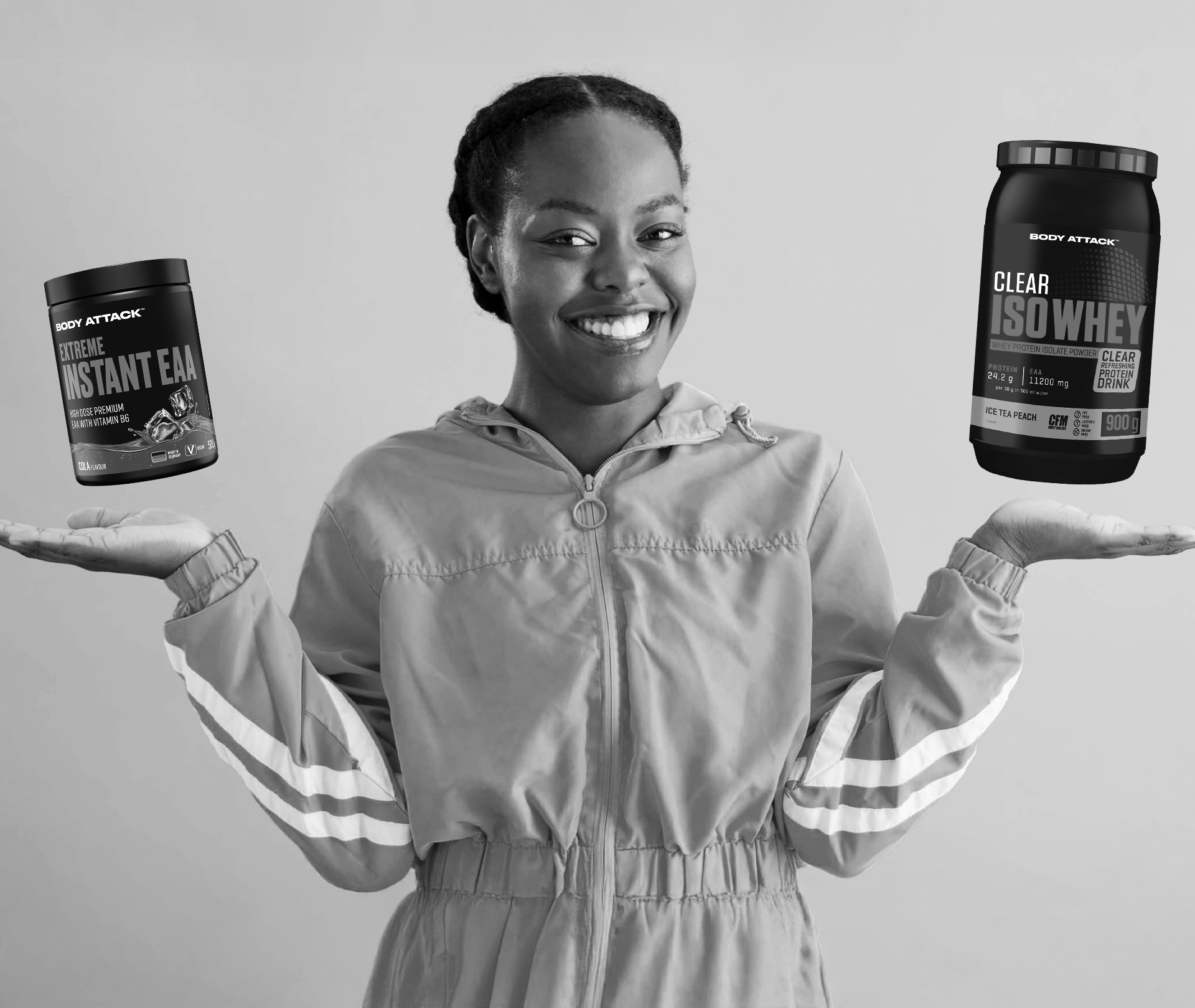 Frau mit einer Aminosäure Dose und einer Proteinshake Dose auf ihren Händen